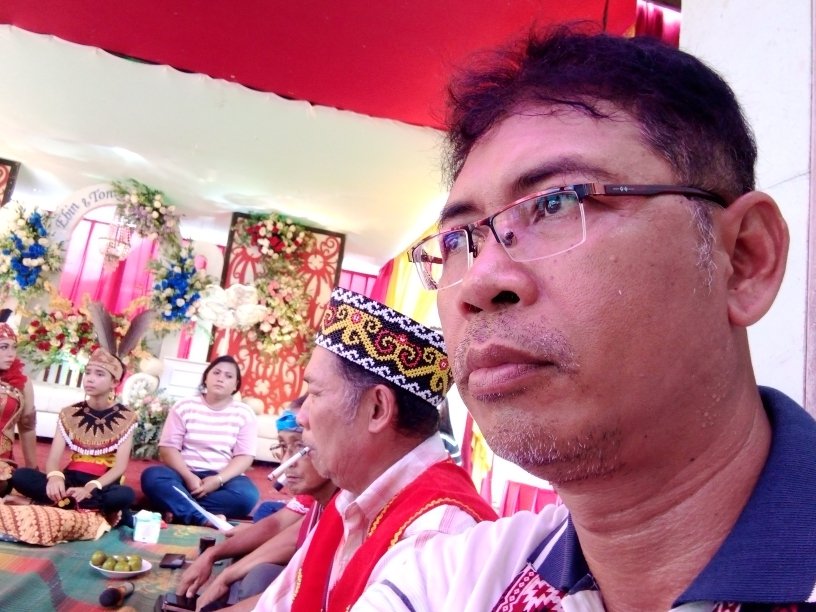 Mendampingi Plt Mangku Adat dalam acara pernikahan di Temurak – Meliau